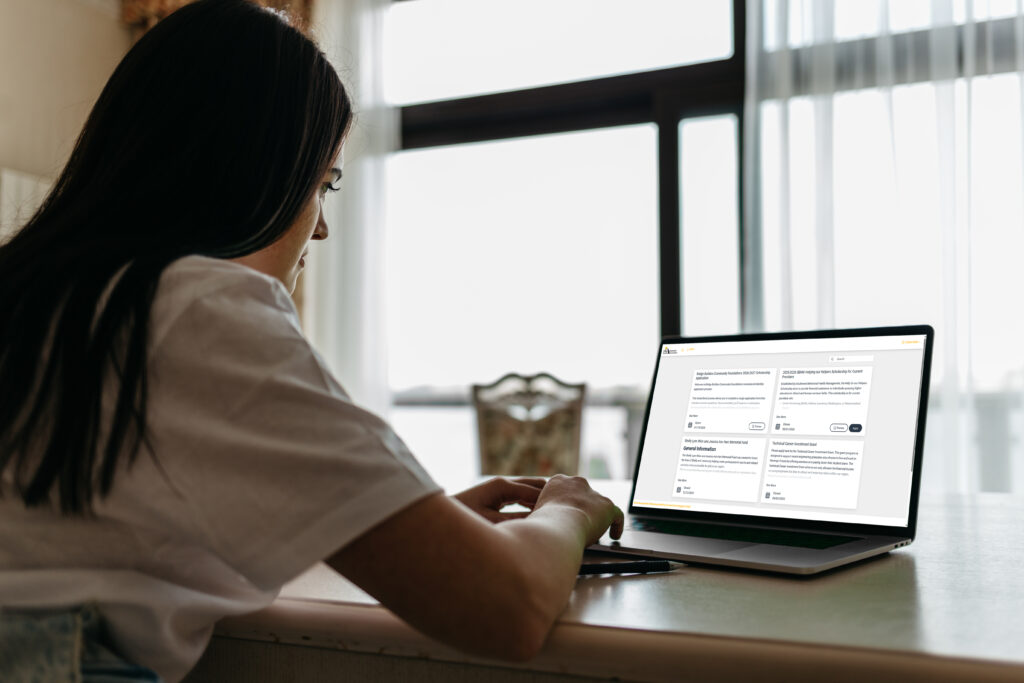 Student browsing scholarships through Bridge Builders Community Foundations website